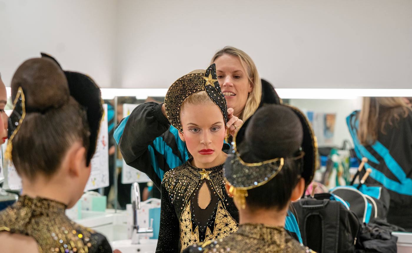 Calisthenics performers getting ready backstage