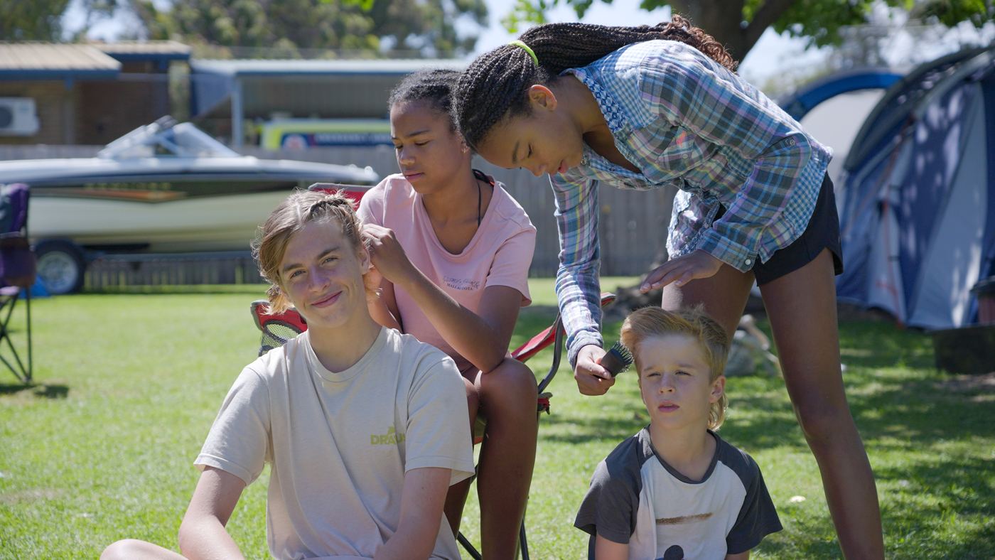 Children playing at a campsite
